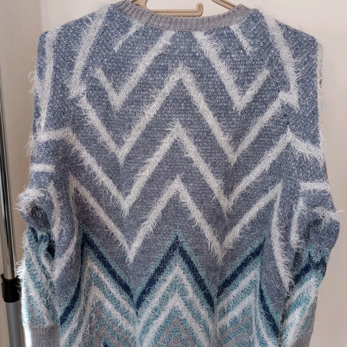 Knitted sweater used with silver details size L