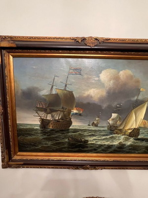 Oil painting of warships in ornate frame like new