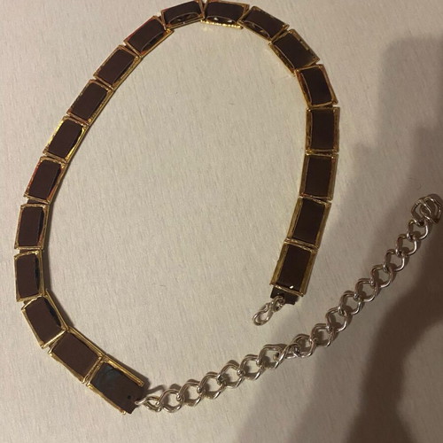 Belt with golden metal details on brown leather, like new