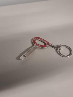 Vintage Rollex keychain bottle opener used