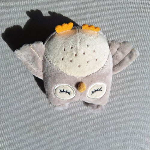 Small owl plush with rattle used