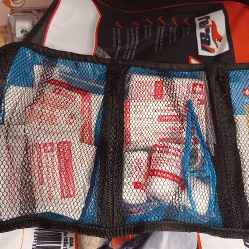 Jump cables, cross wrench, triangle and first aid kit like new