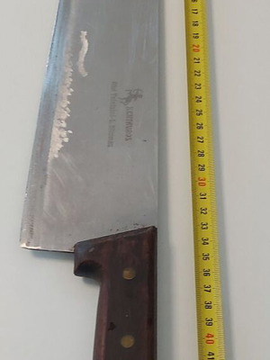 Professional butcher knives, used, with sharpener