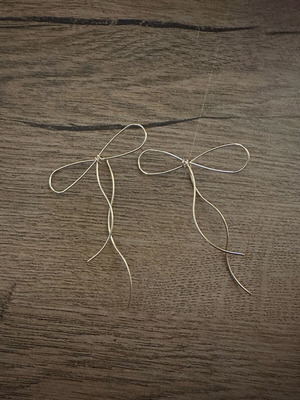 Bow earrings new, gold-colored steel