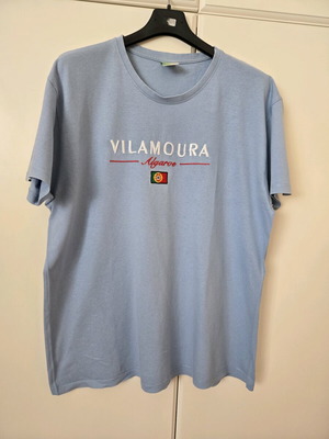 Teen t-shirt used, medium/large, light blue