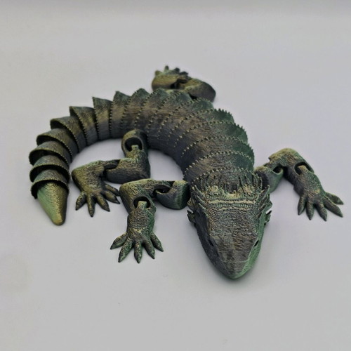 Articulated dragon new, 3d printed from esun pla silk magic material