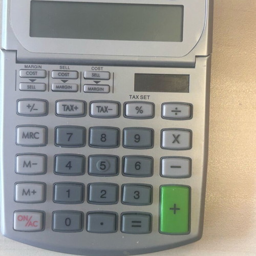 12-digit calculator like new with tilt screen, battery required