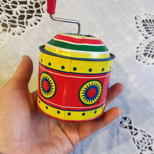 Vintage tin music box with hand crank like new