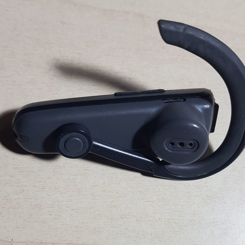 Sony Ericsson HBH-PV703 Bluetooth headset used with charger