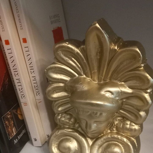 Acroceram with Hermes head like new, gold color
