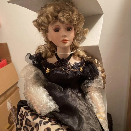 Porcelain decorative doll with light like new