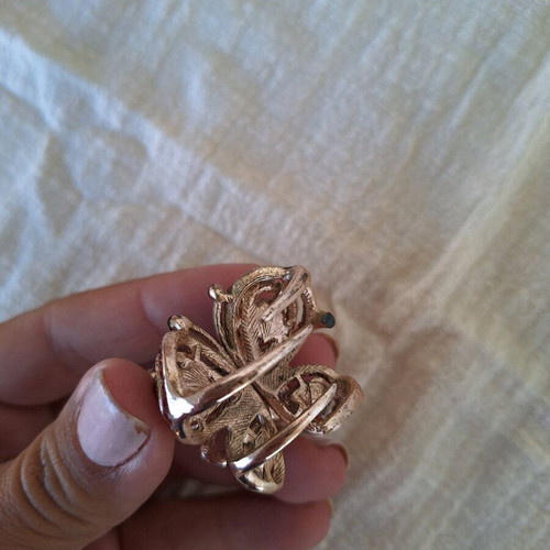 Small butterfly hair clip used with red rhinestones