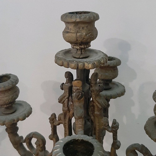 Bronze candlesticks used, pair with patina and carved base