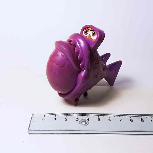 Plastic toy purple fish used with closing mouth