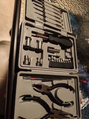 Tool set used with cutter, pliers, screwdrivers, sockets, bits