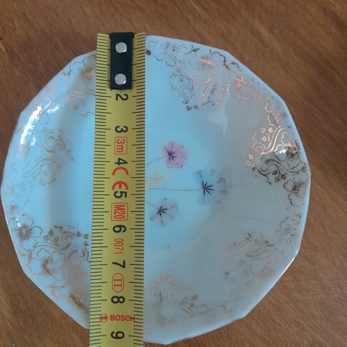Porcelain plates and miniature bowls, old unused