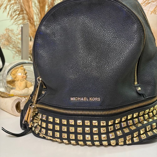 Michael Kors leather backpack used with broken zipper black