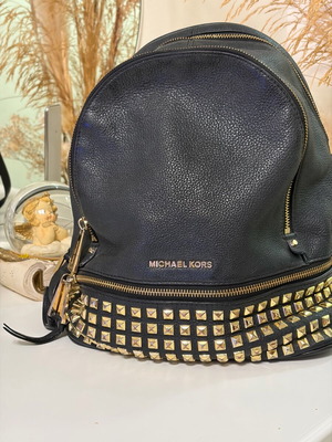 Michael Kors leather backpack used with broken zipper black