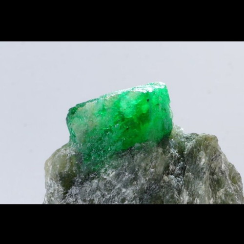 Emerald mineral in rock new with deep green color