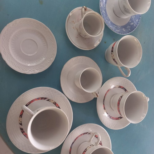 Set of 7 assorted cups and saucers