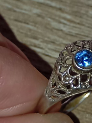 Silver ring with blue topaz filigree design like new