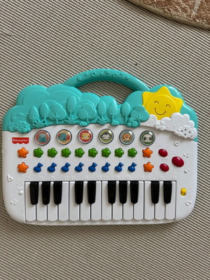 Fisher Price children's piano with music and sounds like new