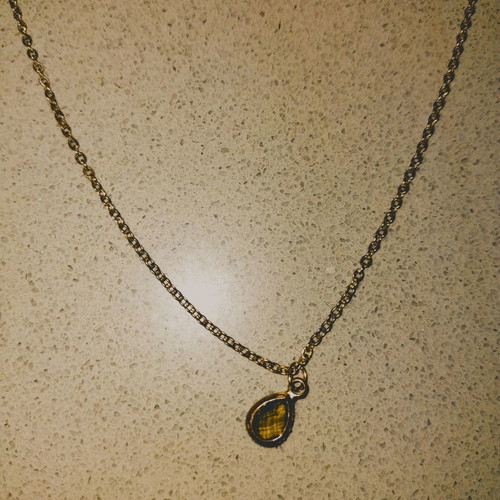 Ozze stainless steel teardrop necklace used with crystal