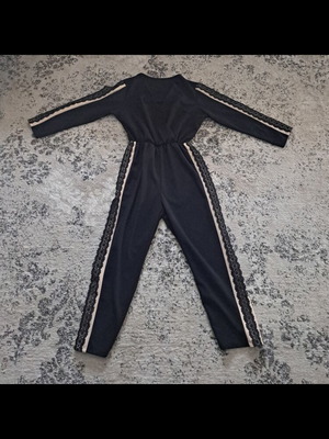 Women's jumpsuit new with tags, black and beige, size M