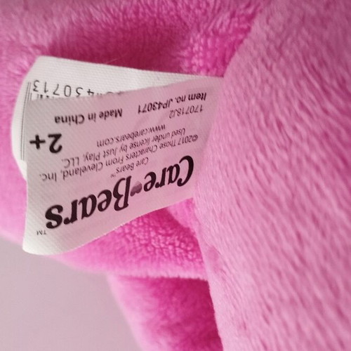 Care Bear Love Bear used, talks and laughs