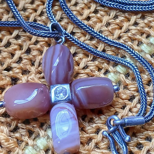 Silver necklace cross with carnelian stones used