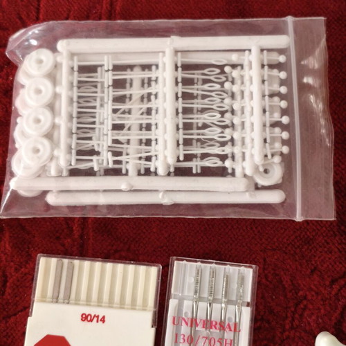 Sewing Machine Accessories Set like new with Needles, Button-Mate Tool & Oil