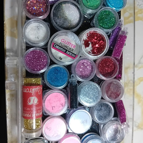 Nail art pigments and glitters used, various colors