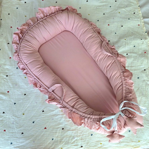 Pink Baby Nest Cocoon like new with pillow and adjustable straps