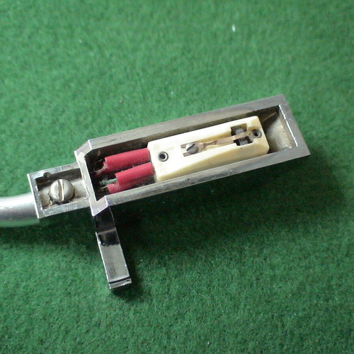 Record player tonearm with head shell and cartridge used, unknown type