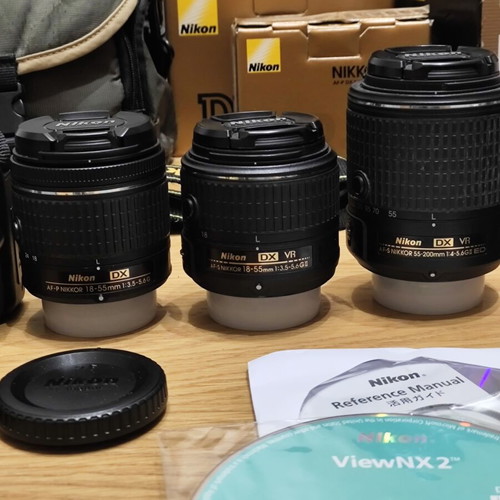 Nikon D3500 DSLR camera body with 3 lenses and accessories