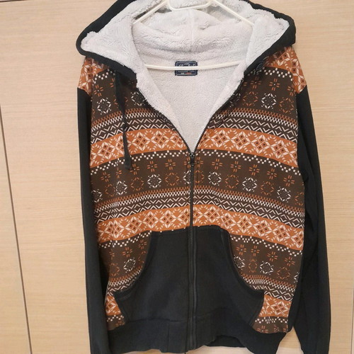 Teen jacket used size large, black with pattern