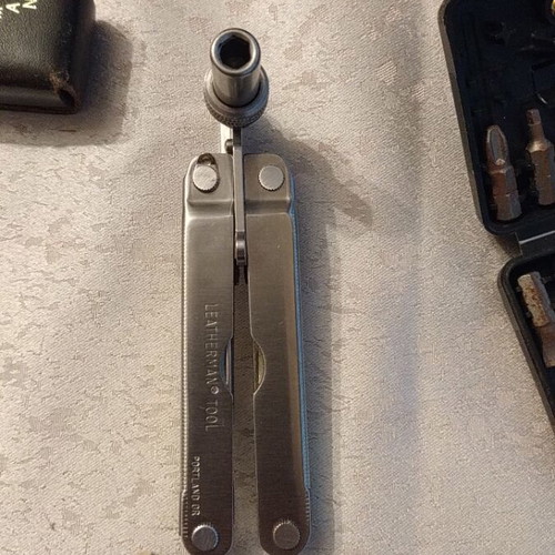 Leatherman multitool and tool adapter like new