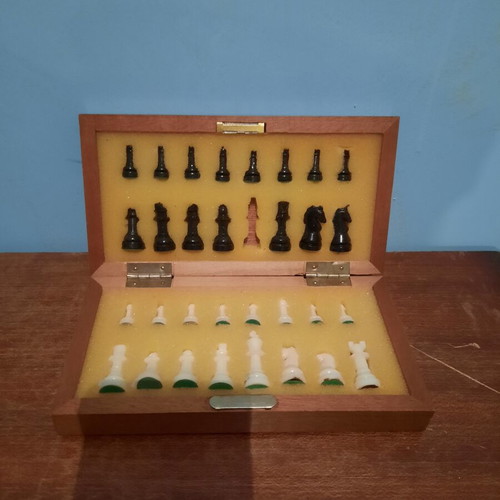 Chess board used, missing the king