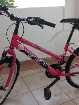 Mountain bikes like new, pink with gears and purple