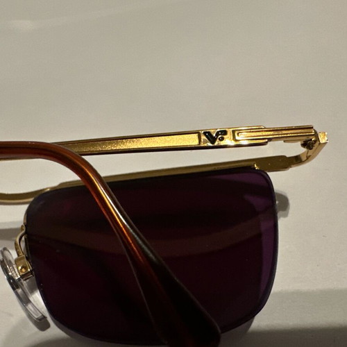 Vogue vintage sunglasses with gold metal frame and purple lenses, new