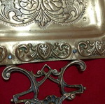 Vintage brass serving tray with embossed handles and angel motifs like new