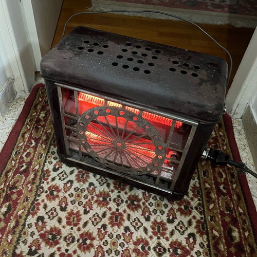 Antique heater used from 1950 in working condition