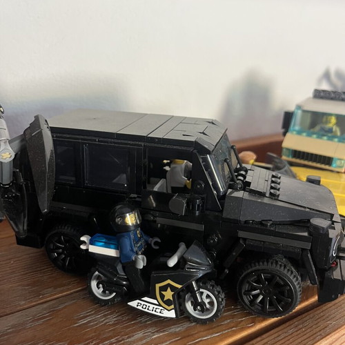 Mercedes-AMG SL 63 Lego set with motorcycle and black jeep