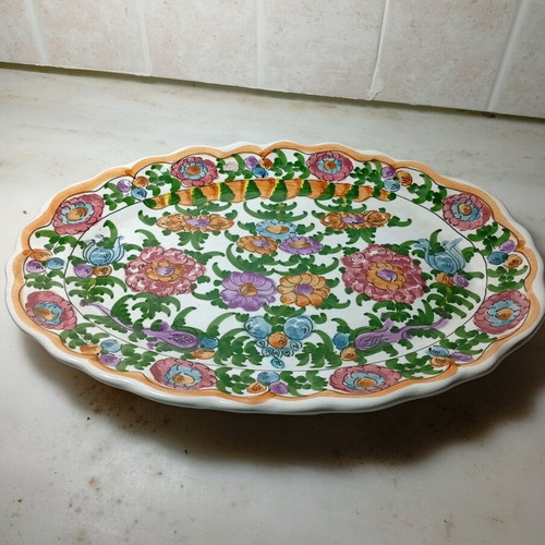 Oval platter Skyrian folk art like new with hand-painted flowers