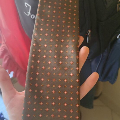 Silk ties new in dark green, orange, and copper colors