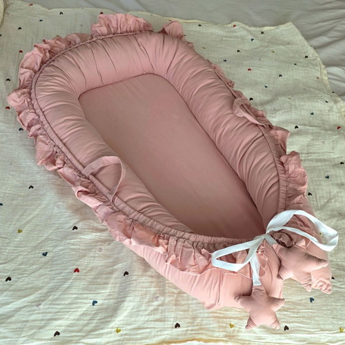 Pink Baby Nest Cocoon like new with pillow and adjustable straps