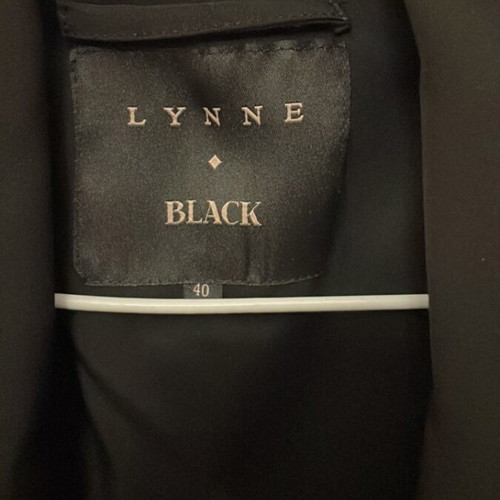 Lynne black sleeveless vest with fabric belt, size 40