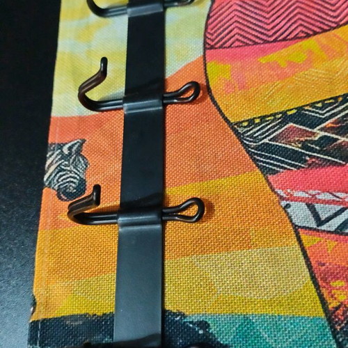 Coat rack with five hooks like new, black
