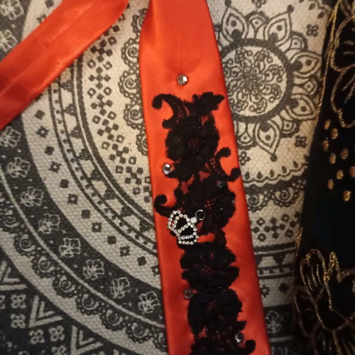 Red tie like new with pearls
