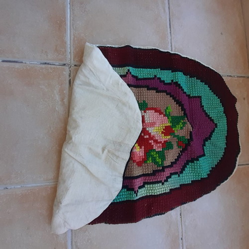 Handmade oval embroidered rug like new